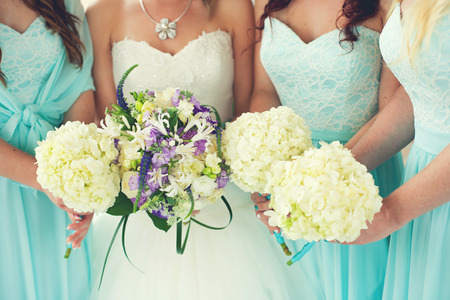 close up of bride and bridesmaids bouquets